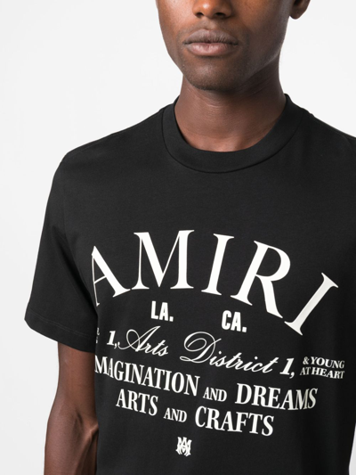 Shop Amiri Logo-print Cotton T-shirt In Schwarz