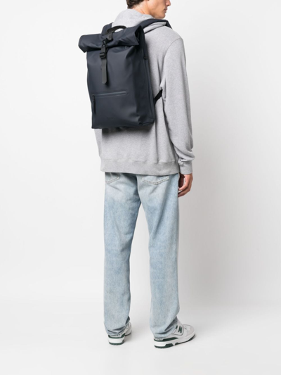 Shop Rains Roll-top Buckled Backpack In Blau