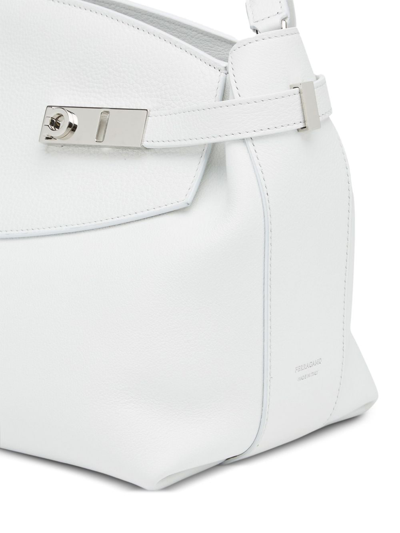 Shop Ferragamo Hug Leather Clutch Bag In White