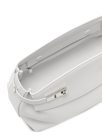 Shop Ferragamo Hug Leather Clutch Bag In White