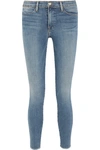 FRAME Mid-rise frayed skinny jeans
