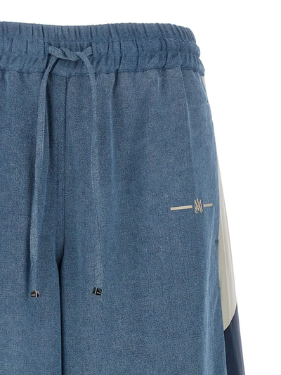 Shop Amiri 'chambray Track' Pants In Light Blue