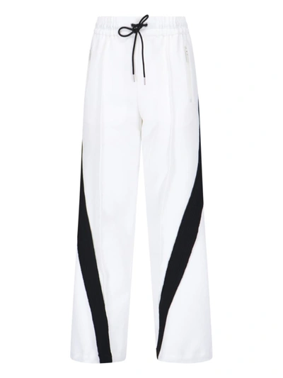 Shop Sacai Trousers In White
