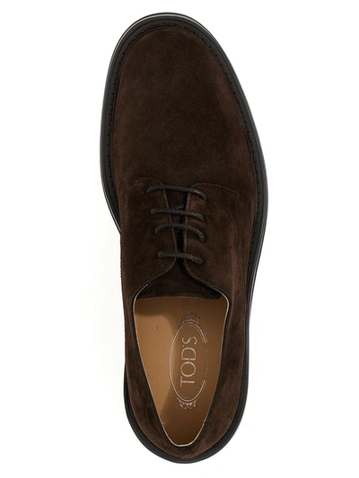 Shop Tod's Suede Lace Up Shoes In Brown
