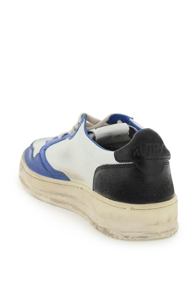 Shop Autry Super Vintage Low Sneakers In White,blue,black