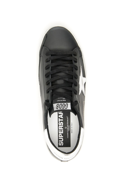 Shop Golden Goose Superstar Sneakers In Black