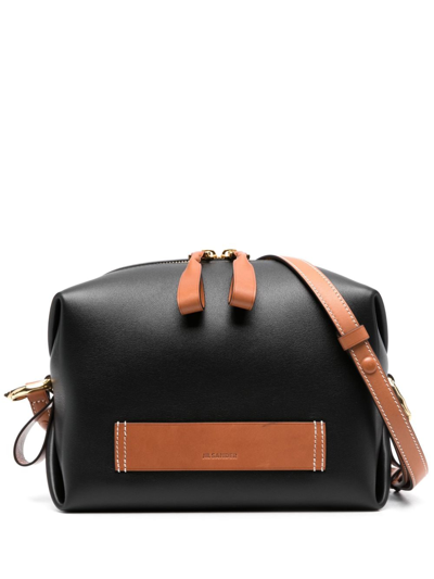 Shop Jil Sander Logo-patch Leather Crossbody Bag In 黑色