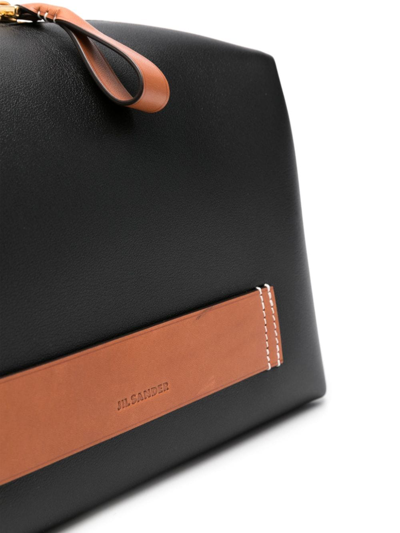 Shop Jil Sander Logo-patch Leather Crossbody Bag In 黑色