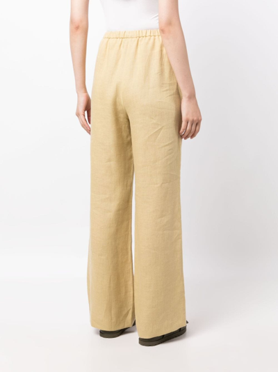 Shop Nanushka Drawstring -waist Linen Trousers In 黄色