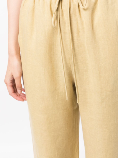 Shop Nanushka Drawstring -waist Linen Trousers In 黄色