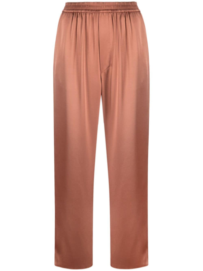 Shop Nanushka Elasticated-waist Cropped Trousers In Orange