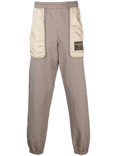 Shop Moschino Logo-patch Panelled Track Pants In Brown