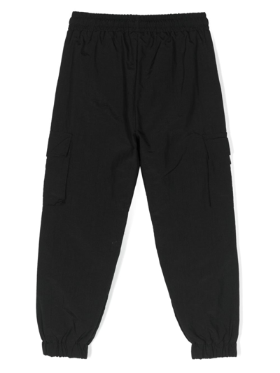 Shop Msgm Logo-patch Cargo Trousers In Black