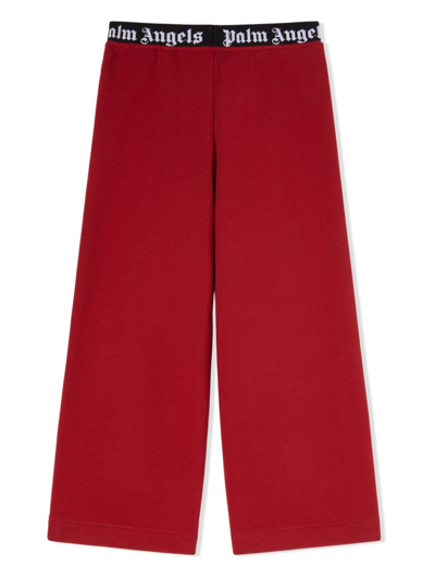 Shop Palm Angels Logo-waistband Cotton Trousers In Red