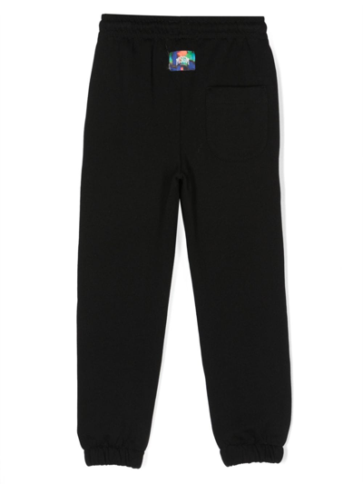 Shop Msgm Logo-print Cotton Track Pants In Black