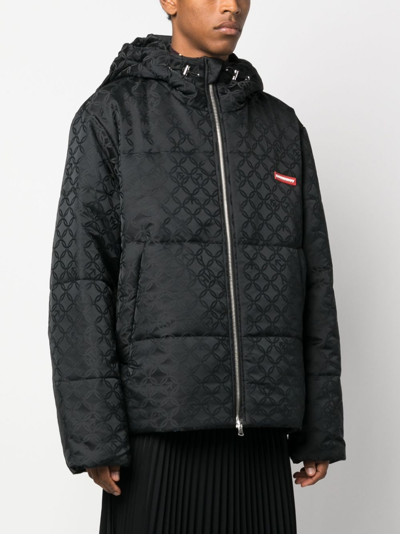 Shop Charles Jeffrey Loverboy Geometric-print Hooded Padded Jacket In Black