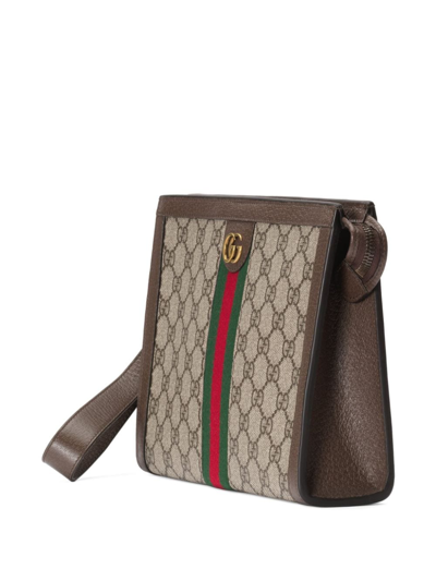 Shop Gucci Ophidia Clutch Bag In Brown