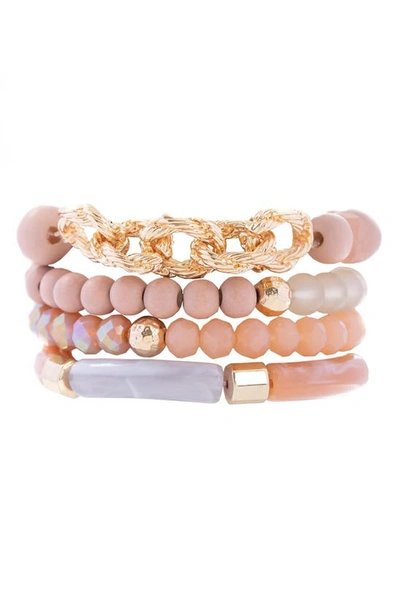 Shop Saachi Set Of Four Wood Beaded Bracelets In Pink