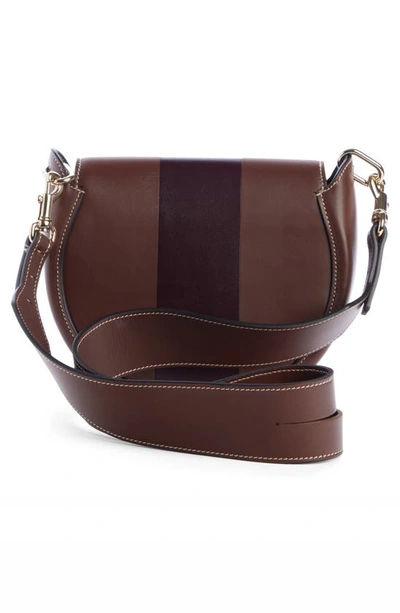 Shop Chloé Small Arlene Leather Crossbody Saddle Bag In Chocolate 25c