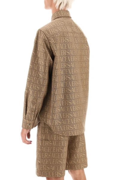 Shop Versace Allover Overshirt Jacket In Brown
