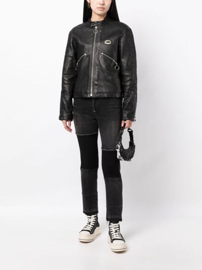 Shop Undercover Logo-patch Cotton Blend Jeans In Black