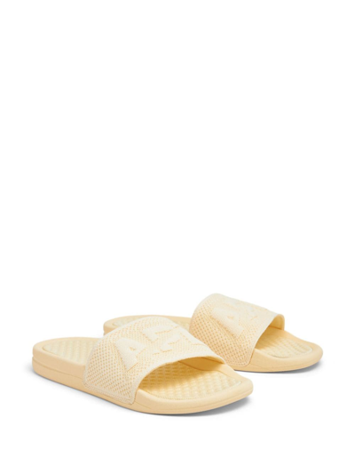 Shop Apl Athletic Propulsion Labs Embossed-logo Knitted Slides In Yellow