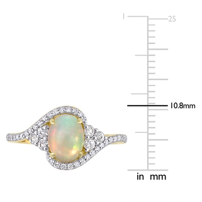 Mimi & Max 1 Ct Tgw Ethiopian Yellow Opal, White Sapphire And 1/5 Ct Tw Diamond Oval Halo Twist Ring In 10k Yel In Silver
