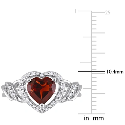 Mimi & Max 1/10 Ct Tw Diamond And Garnet Open Heart Crossover Ring In Sterling Silver In Red