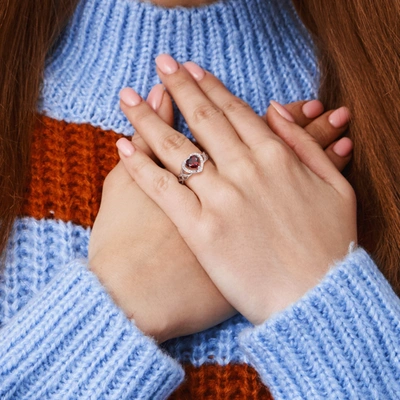 Mimi & Max 1/10 Ct Tw Diamond And Garnet Open Heart Crossover Ring In Sterling Silver In Red