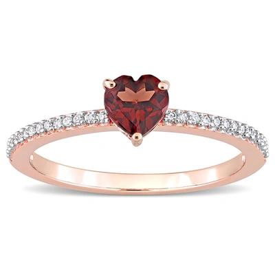 Mimi & Max 1/2 Ct Tgw Heart Shaped Garnet And 1/10 Ct Tw Promise Ring In 10k Rose Gold In Red