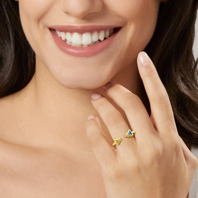 Shop Canaria Fine Jewelry Canaria London Blue Topaz Open-space Arrow Ring In 10kt Yellow Gold
