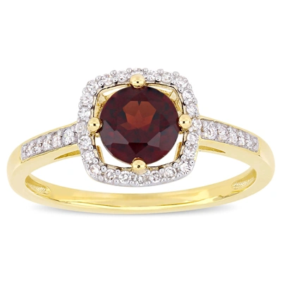 Mimi & Max 1 Ct Tgw Garnet And 1/7 Ct Tw Diamond Halo Ring In 10k Yellow Gold In Red