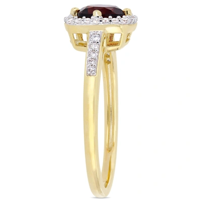 Mimi & Max 1 Ct Tgw Garnet And 1/7 Ct Tw Diamond Halo Ring In 10k Yellow Gold In Red