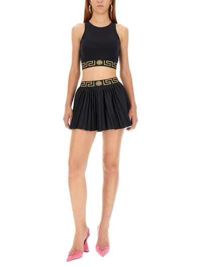 Shop Versace Pleated Sports Shorts With Greek Border In Black
