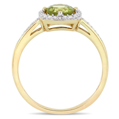 Mimi & Max 7/8ct Tgw Peridot And 1/7ct Tdw Diamond Halo Ring In 10k Yellow Gold In Green