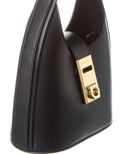 Shop Ferragamo Gancini Buckle Leather Hobo Bag In Black