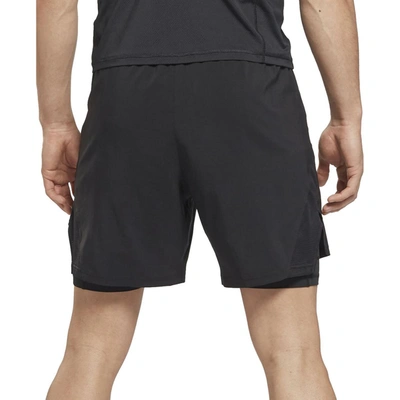 Shop Reebok Mens Running Workout Shorts In Black