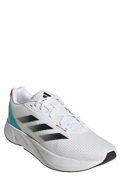 Shop Adidas Originals Duramo Sl Running Shoe In White/ Black/ Lucid Cyan