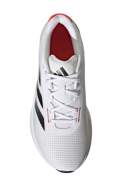 Shop Adidas Originals Duramo Sl Running Shoe In White/ Black/ Lucid Cyan