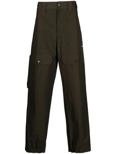 Shop Msgm Cargo Tapered Trousers In Green