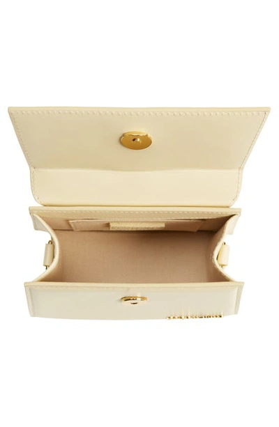 Shop Jacquemus Le Chiquito Moyen Leather Top Handle Bag In Ivory 120