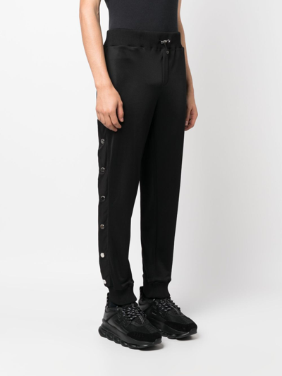 Shop Philipp Plein Engraved-buttons Drawstring Track Pants In Black