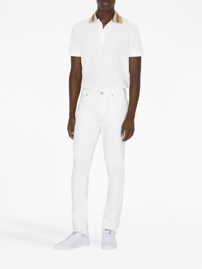 Shop Burberry Check Motif Cotton Polo Shirt In White