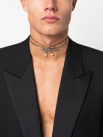 Shop Dsquared2 Bow Curb-chain Necklace In Gold