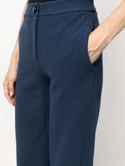 Shop Emporio Armani Chevron-jacquard Mid-rise Trousers In Blue