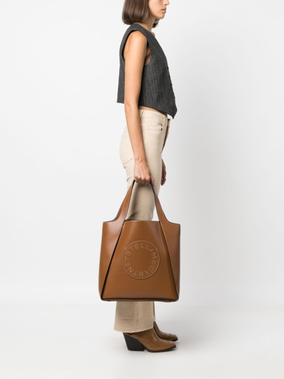 Shop Stella Mccartney Perforated-logo Tote Bag In Brown