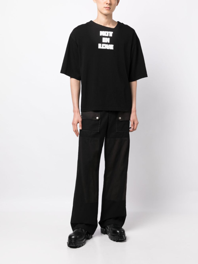 Shop Natasha Zinko Slogan-print Asymmetric Cotton T-shirt In Black