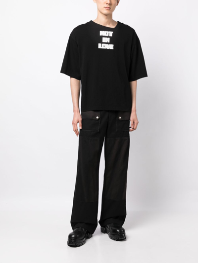 Natasha Zinko Slogan-print Asymmetric Cotton T-shirt In Black