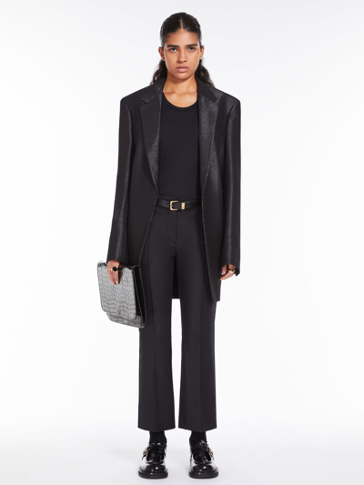 Shop Max Mara Low-rise Flared Trousers In Black