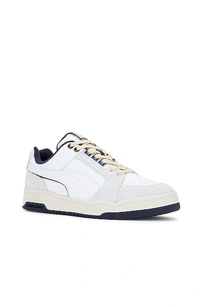 Shop Puma Slipstream Low Baseline Sneaker In White